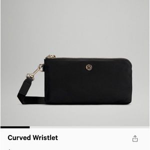 Black curved wristlet from Lululemon. Like new
